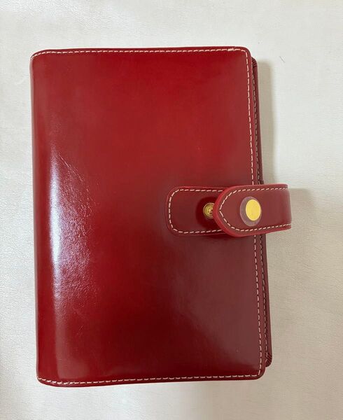 【新品】【未使用】システム手帳 レザー 赤 ゴールドのボタン 白色のステッチ