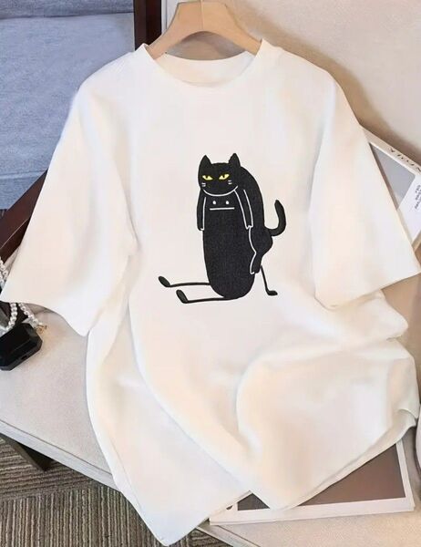 ユニークな猫デザインの女性用カジュアルTシャツ - 半袖、ルーズフィット、クルーネック、軽量の夏用トップス、カジュアルなアットワー