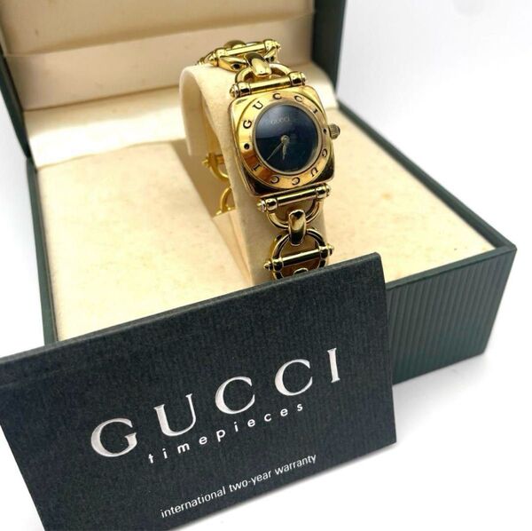 GUCCI グッチ クォーツ 腕時計 アビーシリーズ 黒文字盤 ホースビット 金 稼働品 箱付 6400L