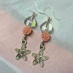 透明ハートピンクローズシルバー色フラワーのハンドメイドピアス