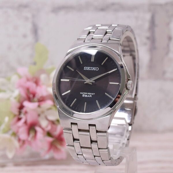 【美品】 セイコー メンズ 腕時計 クォーツ 黒文字盤 ラウンド アナログ SEIKO ブラック文字盤