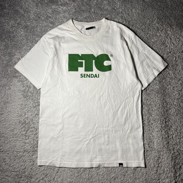 FTC エフティーシー Tシャツ ホワイト 半袖 半袖Tシャツ 白 センターロゴ ユニセックス Lサイズ 古着