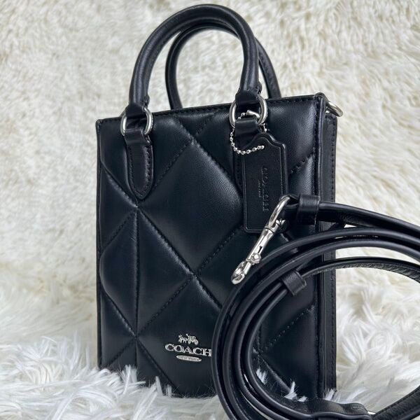 美品 COACH コーチ ショルダーバッグ 肩掛け 斜め掛け ノースサウスミニトート キルティング チャーム ブラック 黒