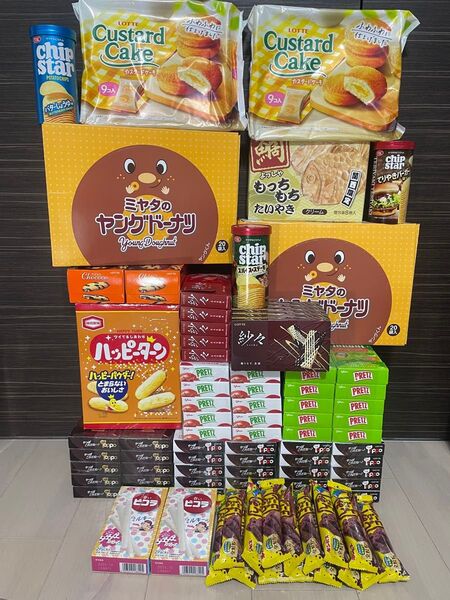 大量お菓子詰め合わせトッポプリッツヤングドーナツ紗々チップスターしみチョコカスタードケーキたい焼きハッピーターンピコラミルキー