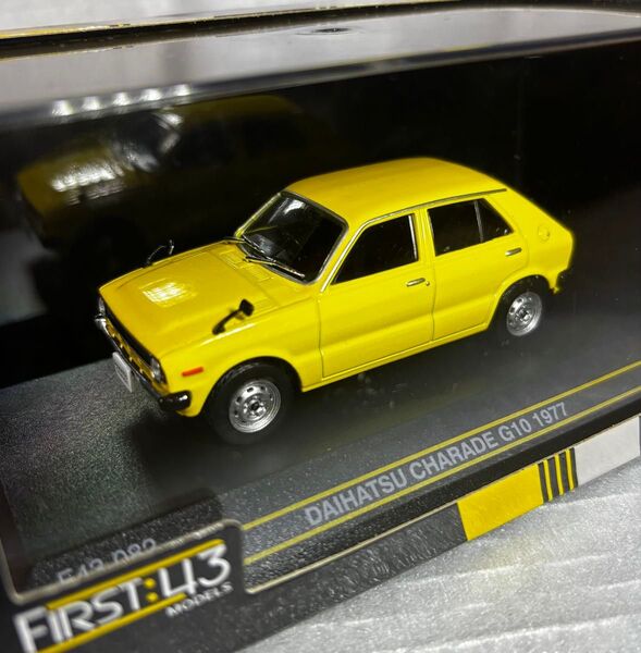 1/43 ミニカー First43 モデル ダイハツ シャレード G10 1977 黄 昭和 旧車 4ドア ハッチバックセダン