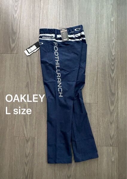 新品 OAKLEY オークリー ゴルフ パンツ 吸水速乾 杢調柄 紺系 Lsize