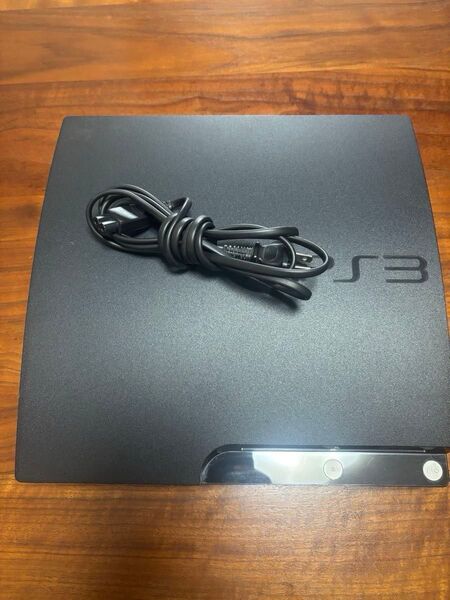 PS3 本体 CECH-2000A ブラック プレイステーション3と電源コード、リモコン。