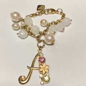 &chouette アンドシュエット イニシャルバックチャーム