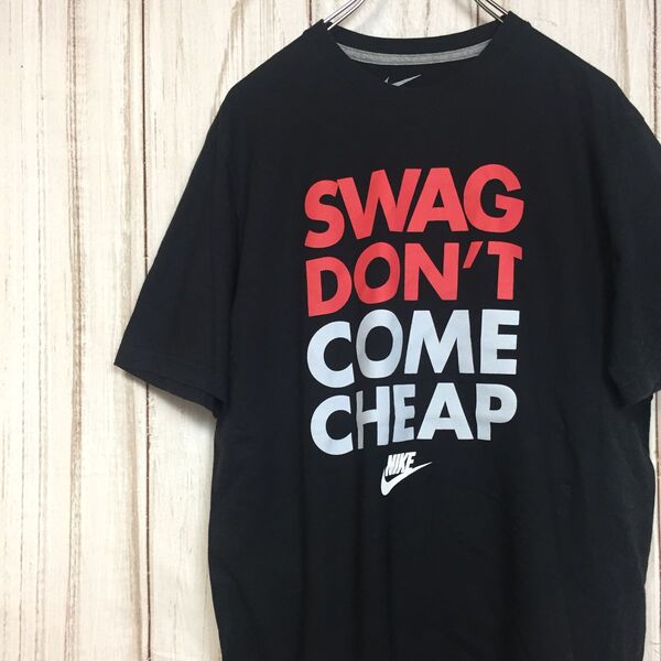 【海外限定 ナイキ 半袖プリントTシャツ】ビッグロゴ プリントデザイン L 黒 NIKE 古着