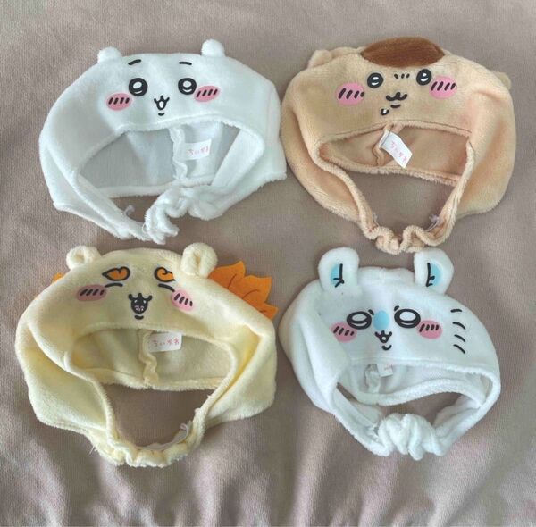 ねこのかぶりもの ちいかわ くりまんじゅう モモンガ シーサー ぬいぐるみ