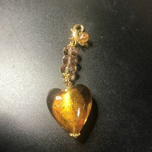  gold dust entering Heart glass. strap 