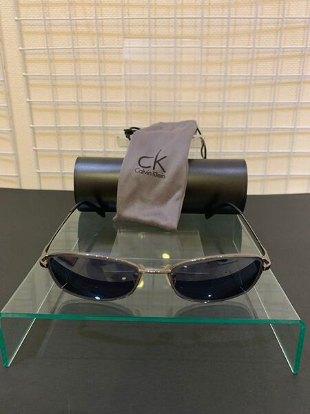 【ケース付美品】カルバンクライン サングラス 眼鏡 フレームグレー レンズグレー ミラーブラウン 度入り 近視 計測表あり