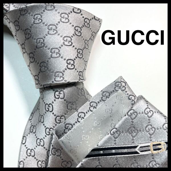 名作☆美品☆ GUCCI グッチ ネクタイ シェリーライン GG柄 ベルト柄 艶 光沢感 シルバー系
