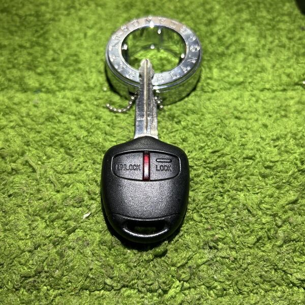 NO:05 三菱 キーレス リモコン 2ボタン 赤ランプ 刻印:F CV5W デリカD5 GA3W RVR 等