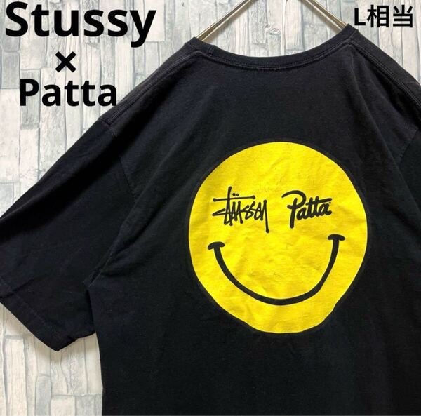 Stussy ステューシー Patta パタ コラボ スマイリー ニコちゃん 半袖 Tシャツ デカロゴ ビッグロゴ サイズM ブラック 限定品 メンズ
