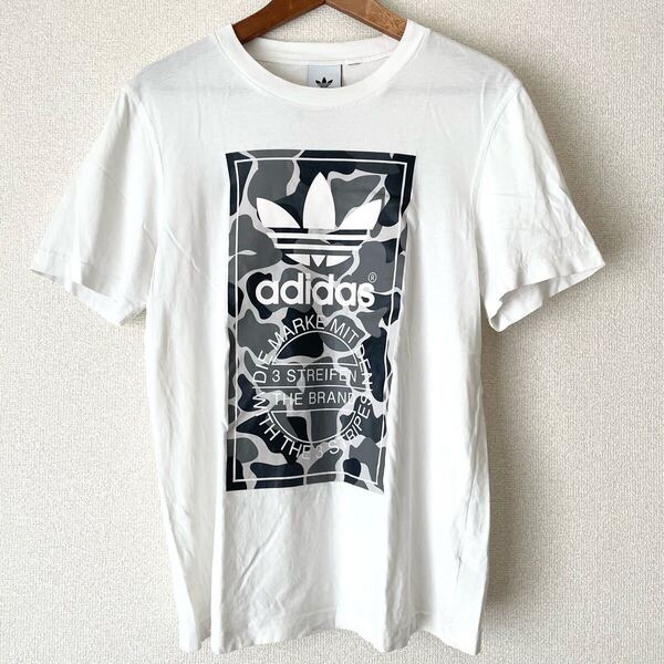 アディダス Tシャツ ホワイト 半袖 古着 コットン 白 M 迷彩柄 トレフォイル オリジナルス カモフラ 夏 プリント カッコいい