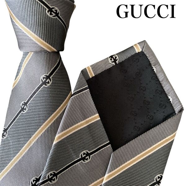 極美品 GUCCI グッチ ネクタイ トムフォード期 デザイン GGインターロッキング レジメンタル グレーストライプ イタリア製 シルク&キュプラ