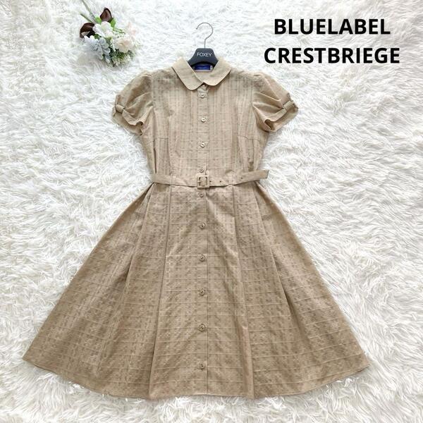 BLUELABEL CRESTBRIEGE ブルーレーベルクレストブリッジ ワンピース 38 ベージュ チェック ロゴ刻印 Aライン ベルト 半袖 フレア 高級感