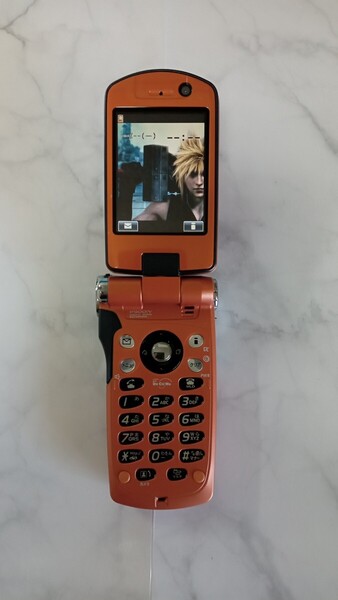 K4512 docomo FOMA P900iV ブロンズオレンジ ファイナルファンタジー ガラケー ケータイ 簡易動作確認&簡易清掃OK 判定〇 送料無料