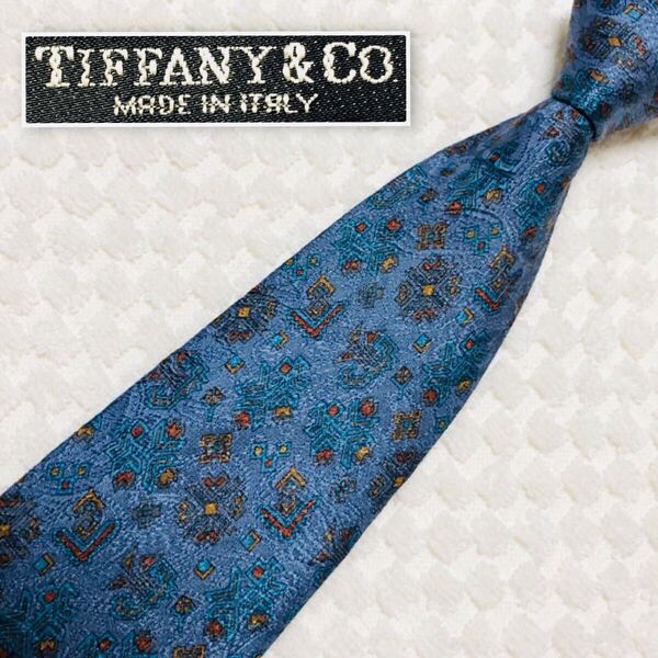 ■美品■TIFFANY&Co. ティファニー Tデザイン ネクタイ 総柄 シルク100% イタリア製 ブルー系 ビジネス
