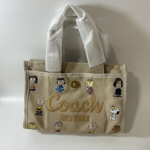コーチ coach COACH カーゴトート ピーナッツ スヌーピーコラボ ベージュ