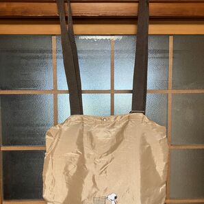 ピーナッツSNOOPY柄のミニリュックサック薄手塩化ビニール素材 薄い茶色 軽量