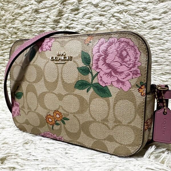 COACH コーチ カメラバッグ クロスボディ 薔薇 フラワープリント 斜め掛け シグネチャー ショルダー ポシェット PVC 革