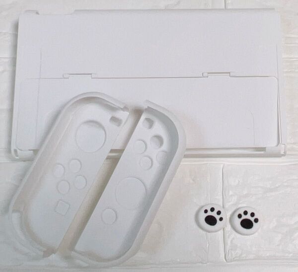 白 ホワイト 肉球 可愛い Nintendo Switch有機EL専用カバー 新型スイッチ専用ケース 任天堂 ハードタイプ