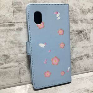 【GALAXY A20/A21】手帳型ケース 桜が舞うシンプルデザイン 水色 空色 青 カード・お札収納 スタンド機能 横置き