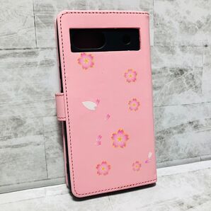 【Google Pixel7A】手帳型ケース 桜が舞うシンプルデザイン ピンク カード・お札収納 スタンド機能 横置き