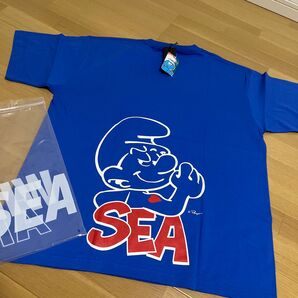 ウィンダンシー WIND&SEA スマーフ SMURF コラボ 新品 メンズ XL ロゴ Tシャツ