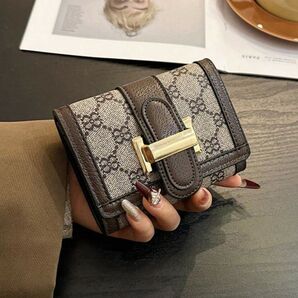 レディース 女性 ショートウォレット 折り畳み財布 バックル フラップデザイン ブラウン ビンテージ カジュアル146422