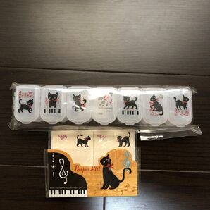 黒猫と音符の柄 7連ピルケース、付箋紙セット 未使用品 黒猫 音楽