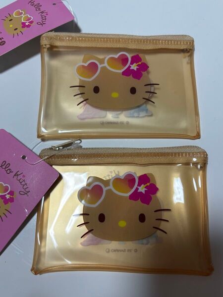 日焼けキティフラットポーチS 同柄2個 サンリオ セリア キャンドゥ ダイソー