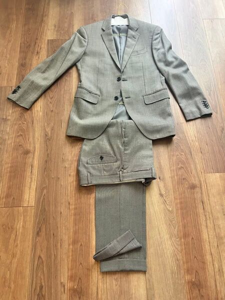 グレー ビジネススーツ上下 2つボタンジャケット(クリーニング済み)The suit company