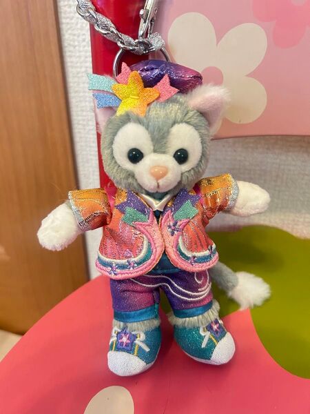 香港ディズニー 20周年 ジェラトーニ ぬいぐるみキーチェーン キーホルダー バッグチャーム 画像の子 新品タグ付き