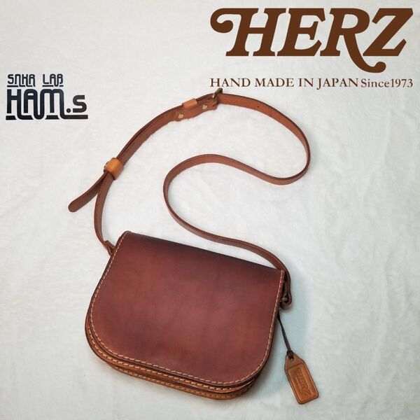 美品 現行 HERZ ヘルツ ショルダーバッグ ポシェット キャメル フラップ式 ポーチ レザー ミニショルダーバッグ バイカラー