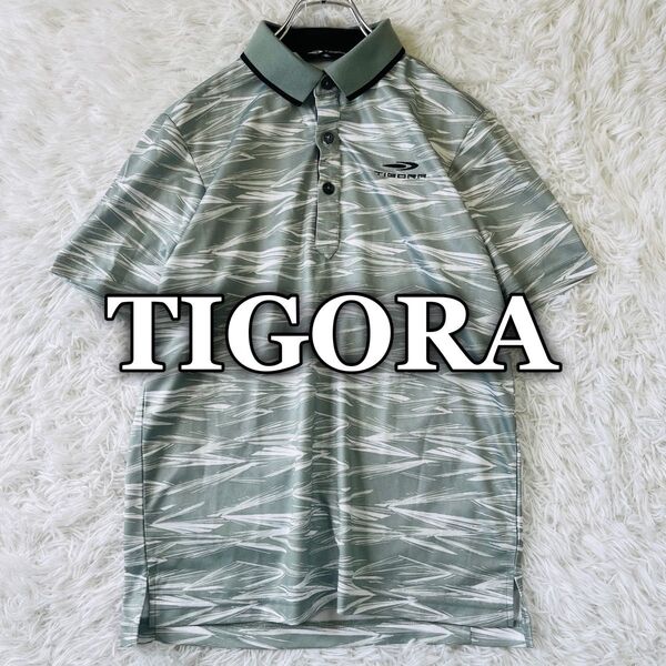 【美品】ティゴラ TIGORA ゴルフウェア 総柄 刺繍ロゴ カジュアル スポーツ 半袖ポロシャツ M