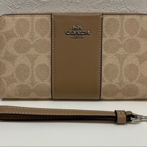 新品 COACH コーチ 長財布 ストラップ付き 本革 コーテッドキャンバス サンド×トープ ¥66,000円→¥15,000円
