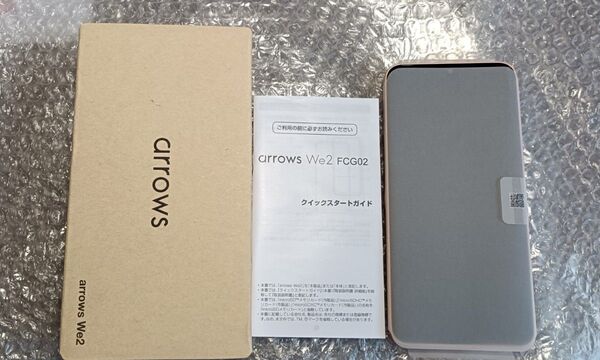 ①(未使用)arrows We2 ライトオレンジ UQ/au版 FCG02