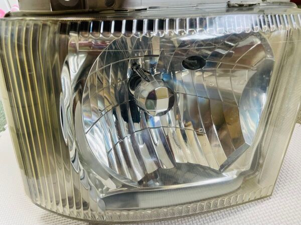 いすず エルフ左ヘットライトASSY ユニット