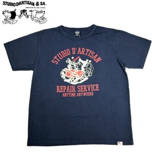 ステュディオダルチザンSTUDIODARTISANUSAコットンプリントTシャツ REPAIR SERVICEマッコイフルカウント