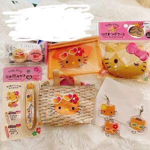 日焼けキティ コンタクトレンズケース 立体爪みがき フラットポーチ つけまつげケース マイクロバッグチャーム アクリルミニチャーム