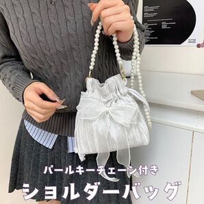 ショルダーバッグ パール チェーン付き 白 韓国 巾着 リボン付き ホワイト ハンドバッグ バッグ 2WAY ショルダー