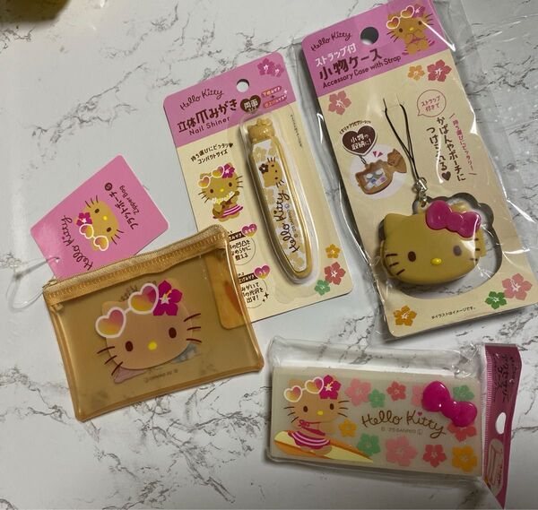 日焼けキティ セリア ストラップ付小物ケース フラットポーチ 爪みがき アクセサリーケース