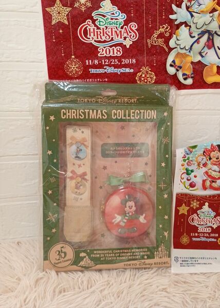 東京ディズニーリゾート35周年クリスマスコレクション カメラ用ストラップ レンズキャップケース付き 未使用品