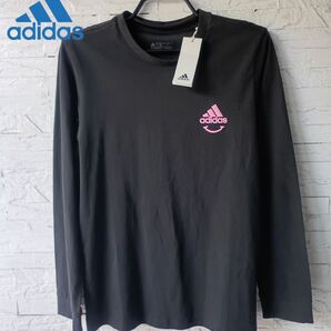 L■新品 adidas(アディダス)Change Through Sports グラフィック 長袖シャツ クロ 定価6,050円