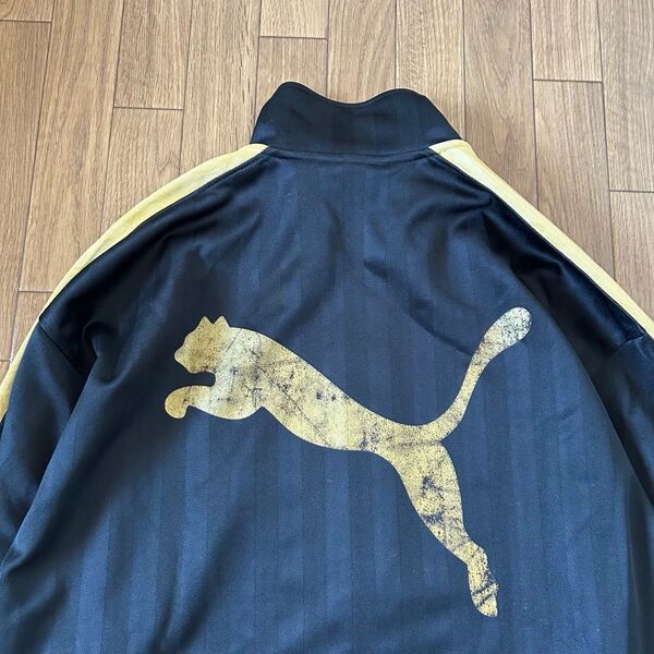 大きいサイズ】プーマ ジャージ トラックジャケット 黒×金 ロゴプリント 日本製 PUMA ヴィンテージ 刺繍