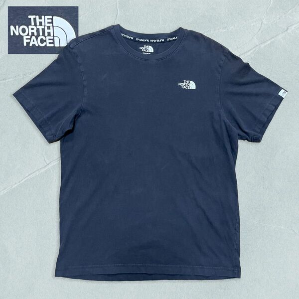 【R207】THE NORTH FACE ザノースフェイス Tシャツ 袖にワンポイントロゴタグ サイズXL ブラックです。