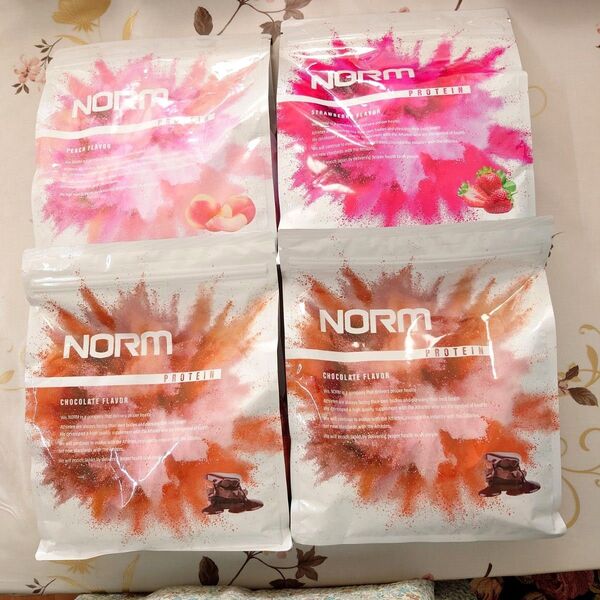 NORM プロテイン4袋(チョコレート2 ピーチ1 ストロベリー1) ホエイプロテイン